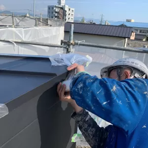 熊本市中央区出水外壁塗装工事・養生作業のサムネイル